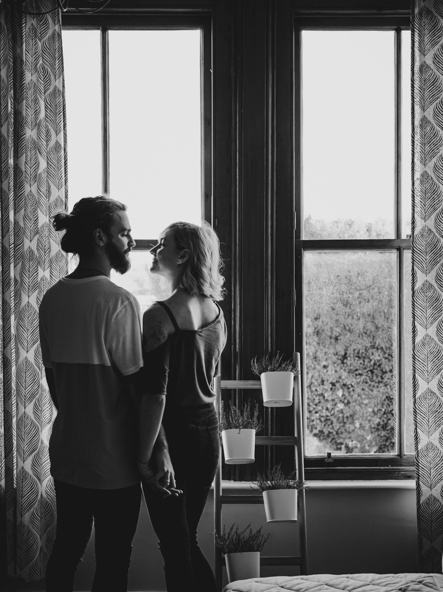 a man and a woman looking at each other