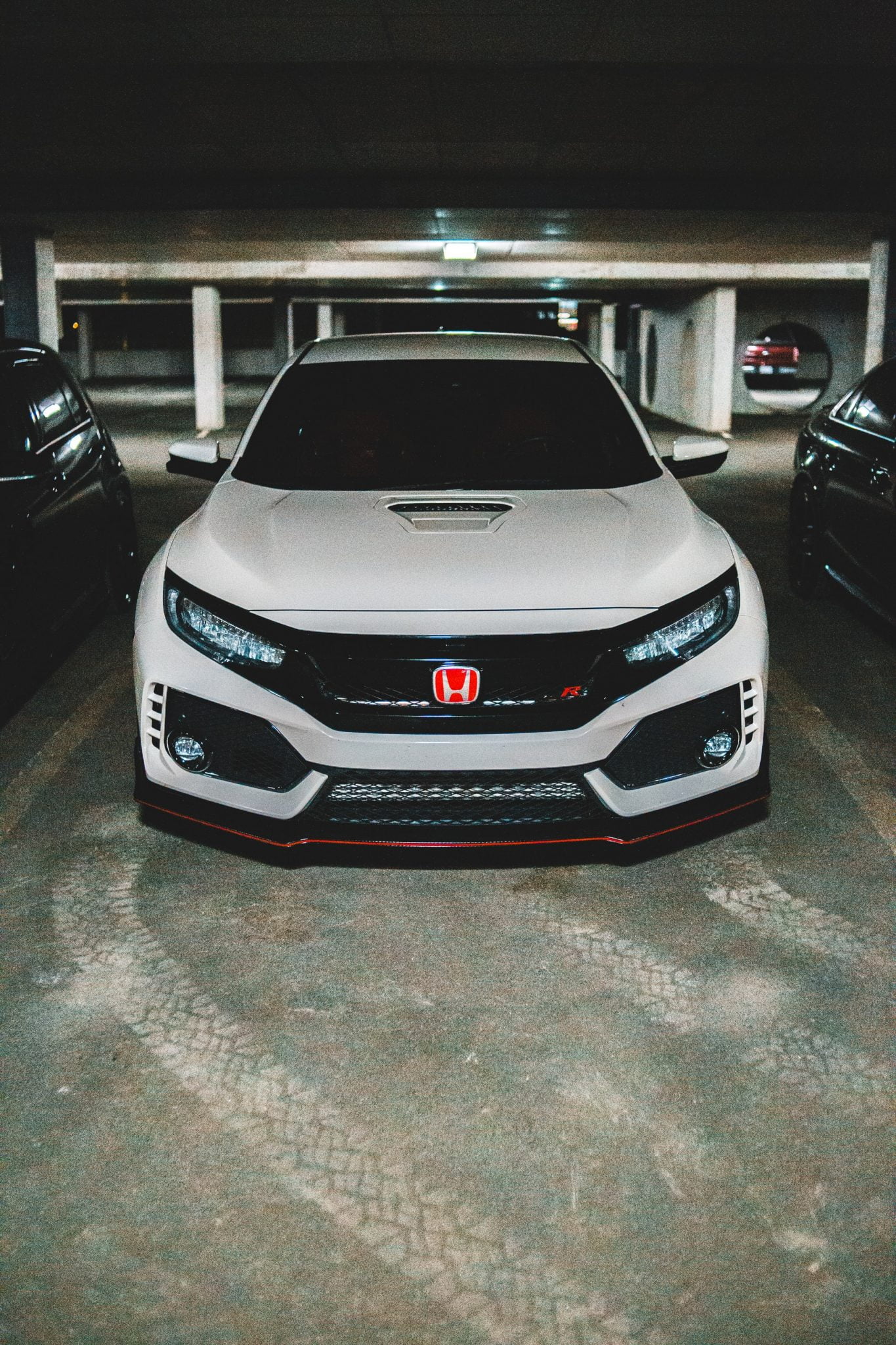 a silver car parked in a garage