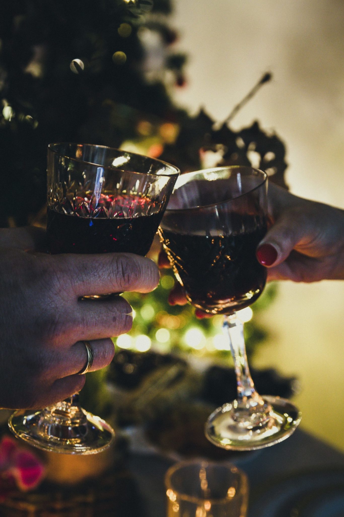 a person holding a glass of wine