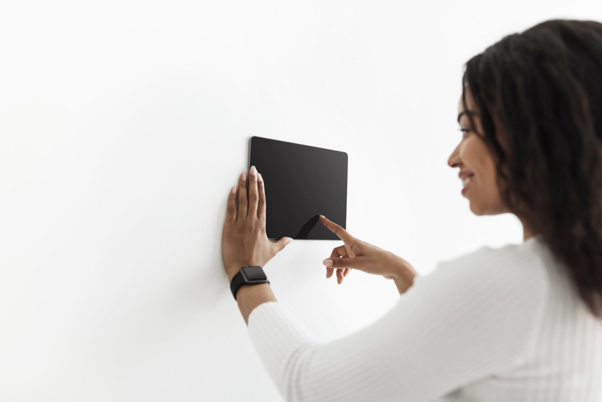 a woman holding a laptop
