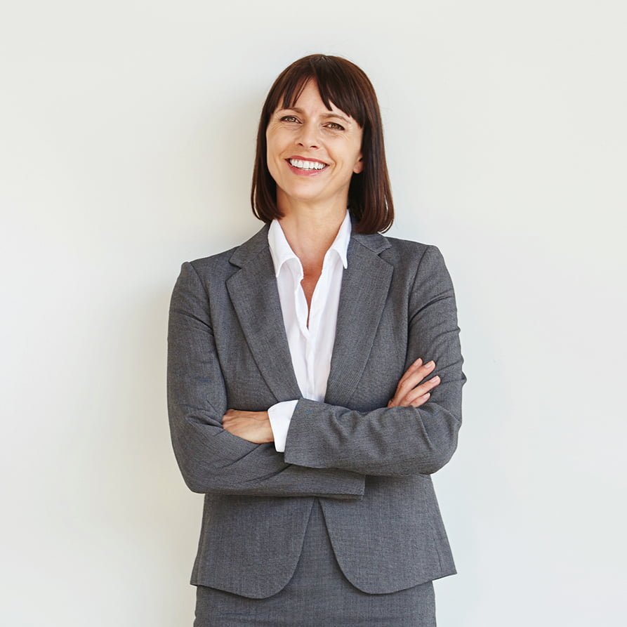 a person in a suit smiling