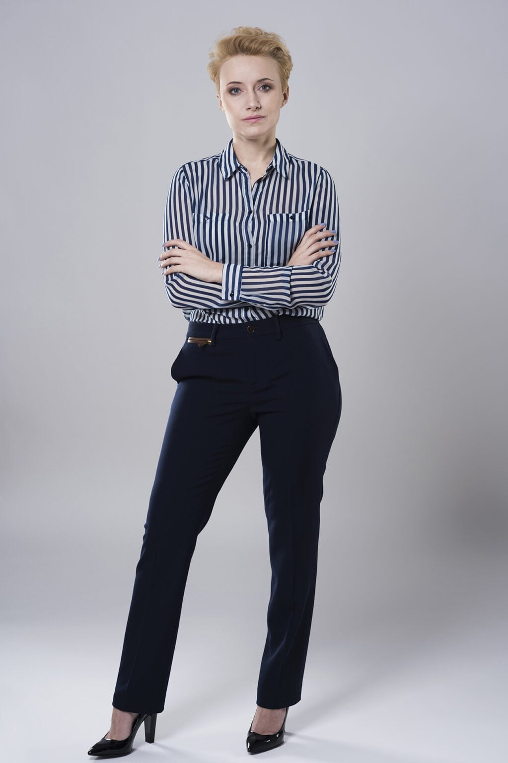 a man wearing a striped shirt