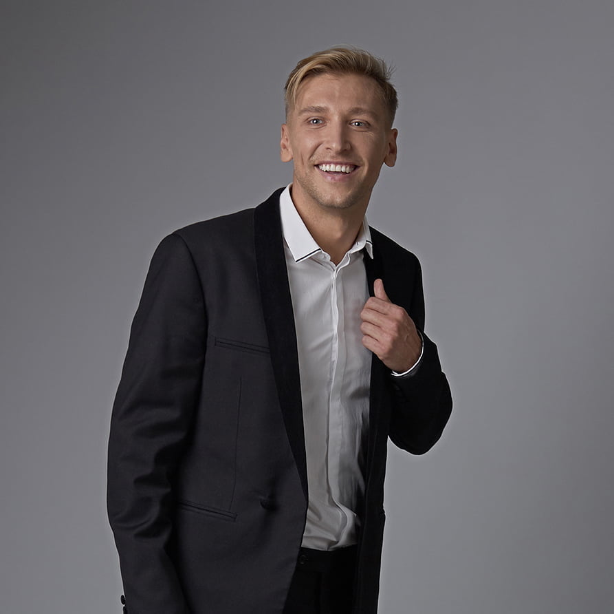 Conan Young in a suit